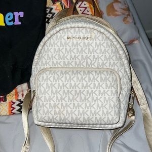 MICHAEL KORS ERIN SMALL CONVERTIBLE PVC LEATHER BACKPACK MK VANILLA